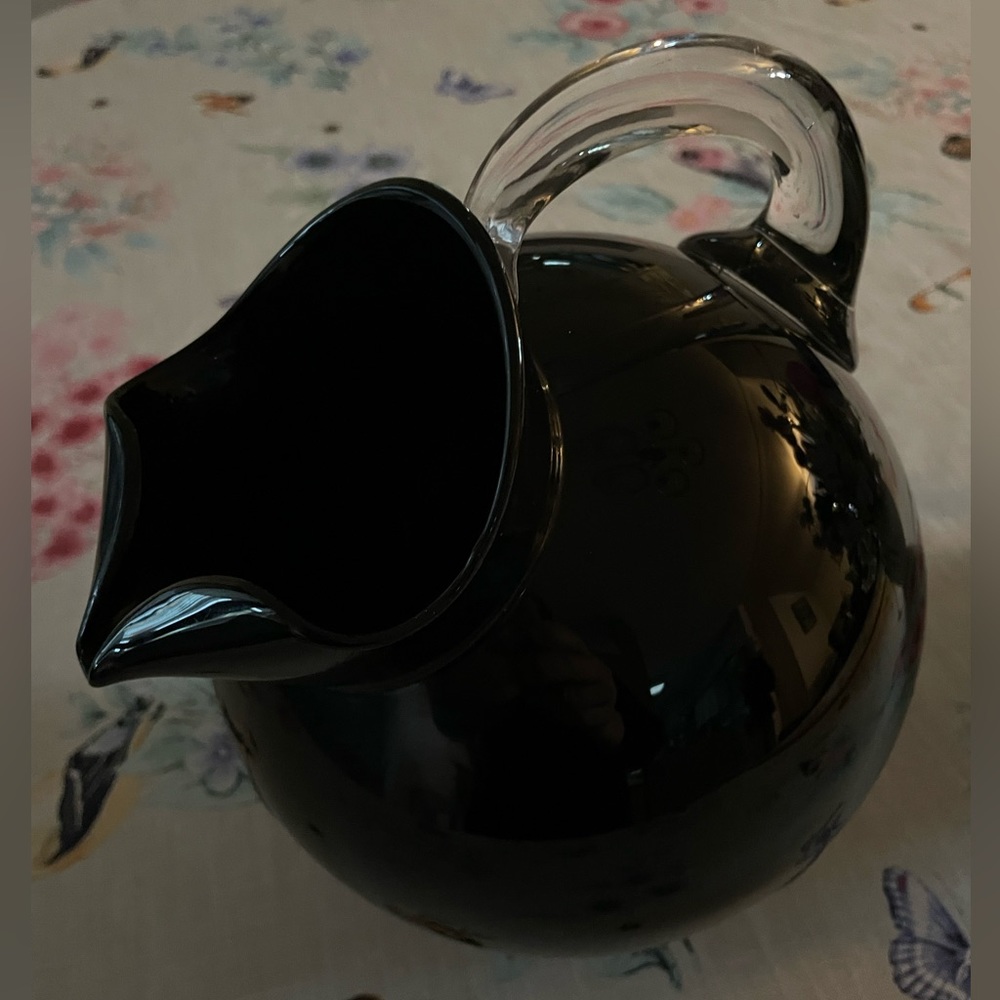 Vintage Art Glass Black Round Shaped Pitcher with Clear Handle.